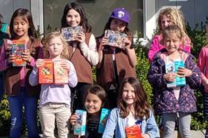 Girl Scouts donate cookies to Orcas Food Bank