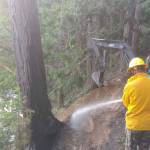 Jonathan Hogue on the excavator during the fire.