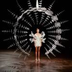 Photo by Taj Howe. The Infinity dress is modeled beneath Omniverse, both in-motion.