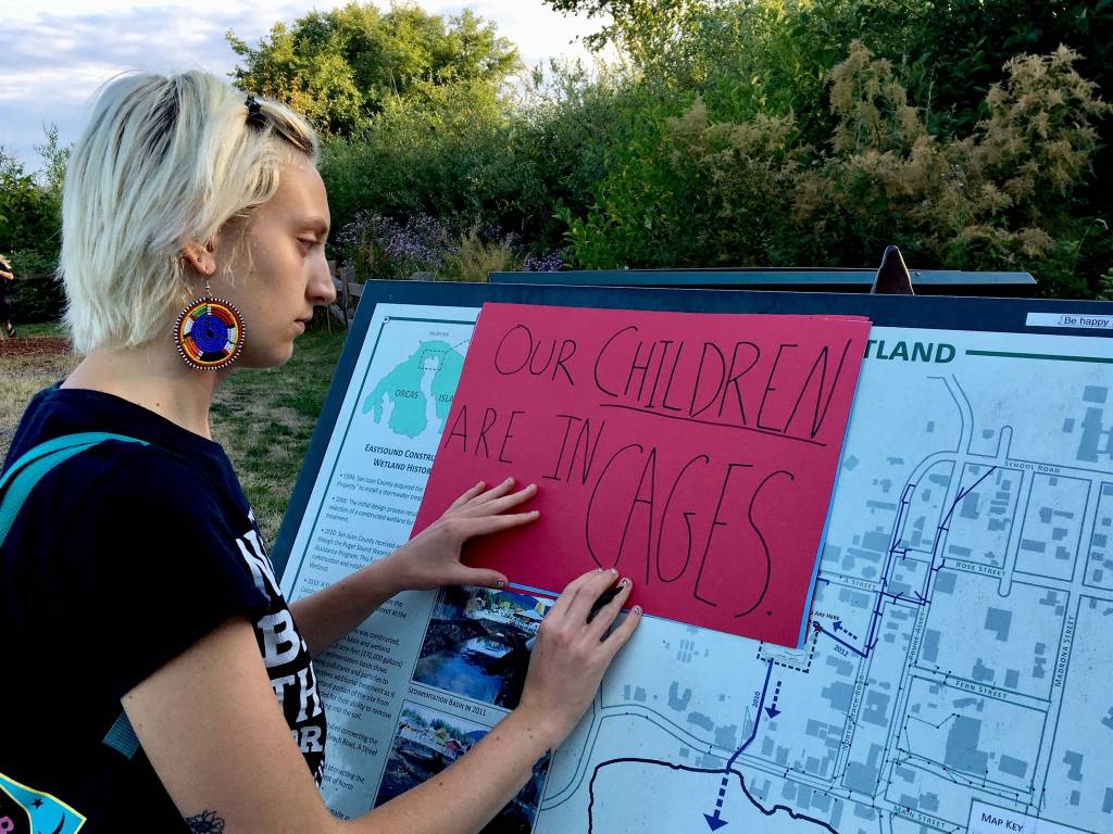 Local speakers inspire action at local vigil protest of ICE detainment camps
