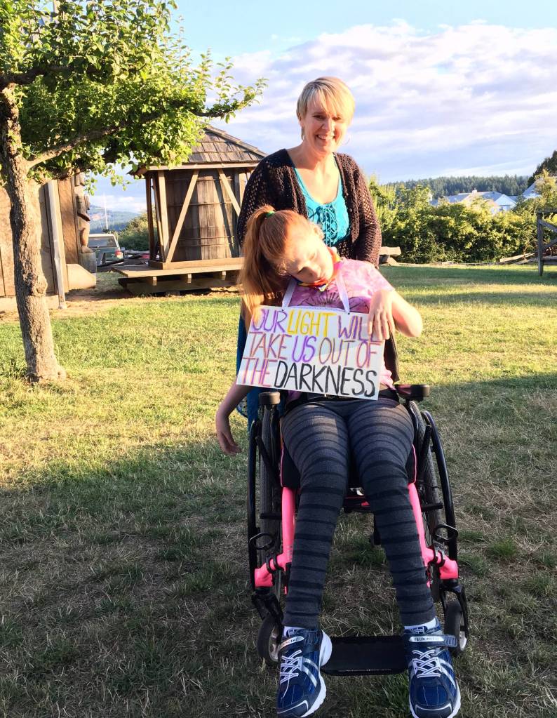 Local speakers inspire action at local vigil protest of ICE detainment camps