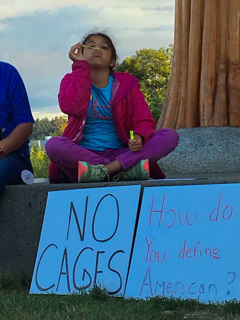 Local speakers inspire action at local vigil protest of ICE detainment camps