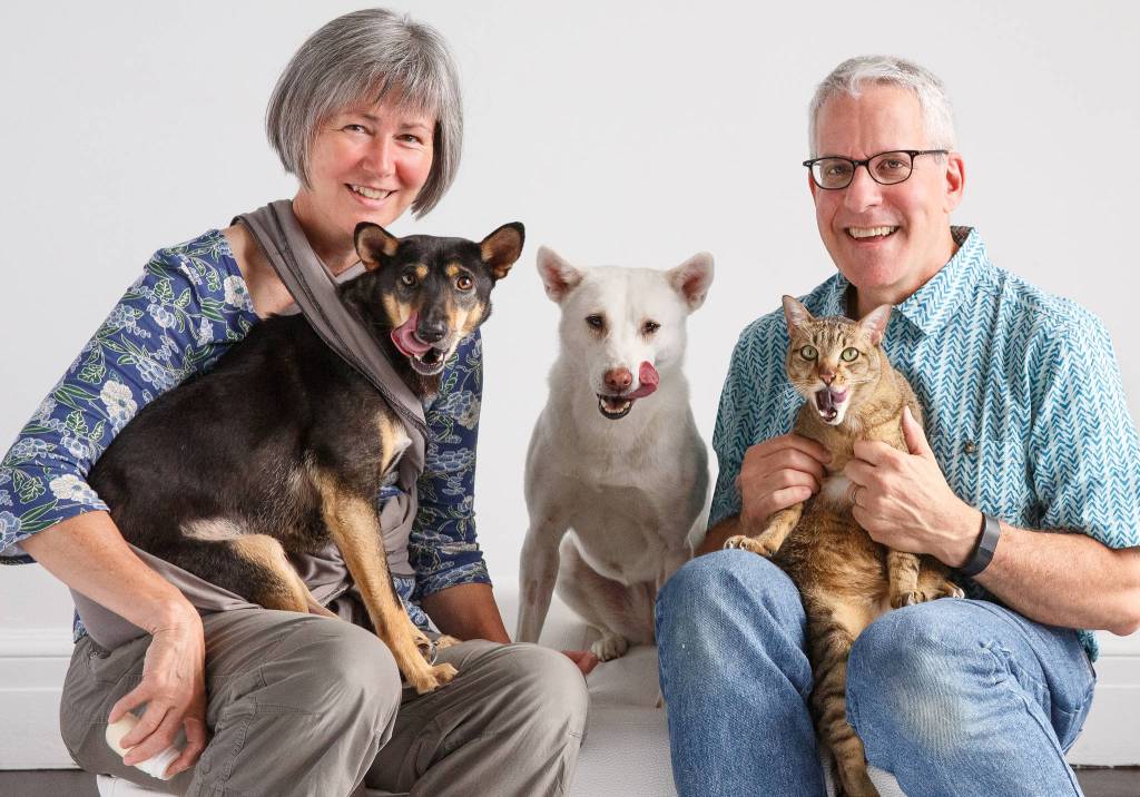 Carol Whitfield of Clooney Dog and Friends/contributed photo                                Tracy Harachi and Nathan Yoffa with their animals from Asia.