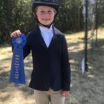 Grace Zwilling shows off one of several first place ribbons at the 2019 San Juan County Fair
