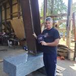 Ron Parker on Orcas Island during the first fitting of the structural beam from the fallen towers of 9/11 earlier in September