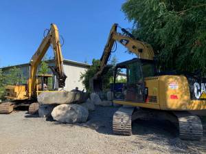 Contributed photo                                Nigrettos moving rock into place.