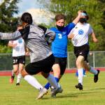 Corey Wiscomb/contributed photo
Tommy Anderson-Cleveland (3) spars with the LaConner goalie for the ball in the red zone.