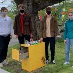 Contributed photo
A stocked food distribution cabinet outside of Spring Street International School. From left to right, Spring Street students Julian Rich, Francis Black, Zach Stults, and Linnea Morris.