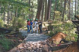 Contributed photo
Washington Trail Association workers pose on a trail they are refurbishing in Moran State Park.