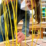 Contributed photo
Bethany Carter utilizing the specialized Go-Bar Deck to do some advanced gluing and bracing on the back of her guitar. There are actually no flat surfaces on the guitar (everything is curved), so the glue and fastening process is very unique and inspiring.
