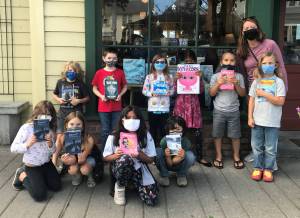 Contributed photo
Teacher Alexis Nigretto with summer reading students outside of Darvills Bookstore in Eastsound.