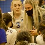 Corey Wiscomb photo
Alecia Talbot listens in as Coach Rachel Wilson shares the game. The key to coming back in that match was sticking together, being humble to know what our jobs were, & who we are… to fight through and keep the focus on each point, one at a time, all the way until the very end, said Wilson.