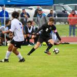 Corey Wiscomb photo
Tommy Anderson-Cleveland reverses the ball in an attempt to penetrate the La Conner defense.