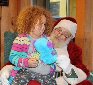 Colleen Smith/staff photo
Santa and an Orcas child.