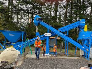 Audrey Hance and Lana Sasan named the new glass crusher Big Blue.