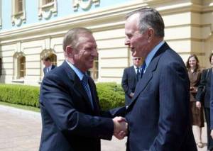 Contributed photo
Former President George Bush shaking hands with Ukrainian President Kuchma, Necia Quest to the right.