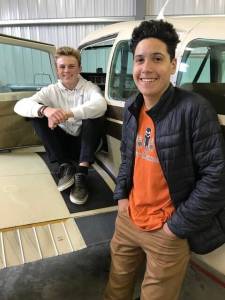 Contributed photo
Left: Scholarship winners Evan Kulper (seated) and Nicholas Rivera (standing).