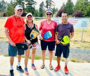 Contributed photo by the Orcas Rotary Club
The 2021 Orcas Island Pickleball Tournament Mixed Doubles champs: Greg Stafford and Jill Bates (gold); Suzanne Olson and Kevin Lee (silver).