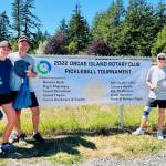 Contributed photo
Lia and Gib Black, gold winners of the open doubles with silver winners Nige Oswald and Rob Peterman – all of San Juan Island.