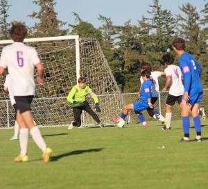 Contributed photo by Corey Wiscomb
Wolverines defend their goal.
Corey Wiscomb photo
Seniors Diego Lago and Keeper Paxton White furiously defend the goal during a FH attack. White held strong making some phenomenal saves with the help of his defensive teammates.