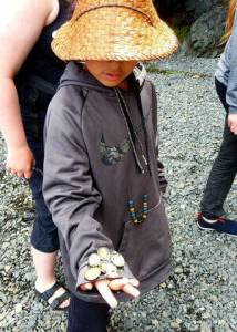 Contributed photo by Erin Licata
A participant in the Madrona Institutes Coast Salish Youth Stewardship Corps while on a Canoe Journey through the San Juan Islands.