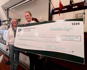 Contributed photo
Orcas Island Yacht Clubs Stephanie Arnold presents a check to Mallory Ballome, Board Member of the Childrens House.