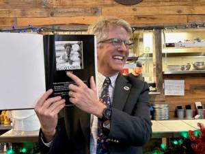 Heather Spaulding/Staff photo
Randy Gaylord shows off the gift presented to him by the Prosecutors Office staff.