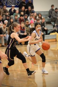 Corey Wiscomb photo.
Sophomore guard Ava Ashcraft drives on Friday Harbor.