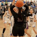 Corey Wiscomb photo.
OHS player Lili Malo applies pressure on the Wolverines.