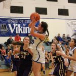 Corey Wiscomb photo.
Junior Sera Knapp hauls an offensive rebound before putting the ball back up and in for two.