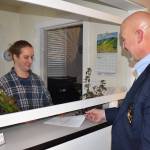 Kelley Balcomb-Bartok\ Staff photo
Newly Elected Sheriff Eric Peter turns in his official election paperwork following his swearing-in ceremony Dec. 30.