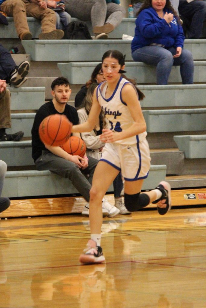 Corey Wiscomb photo. Ava Ashcraft dribbles up the floor for Orcas.