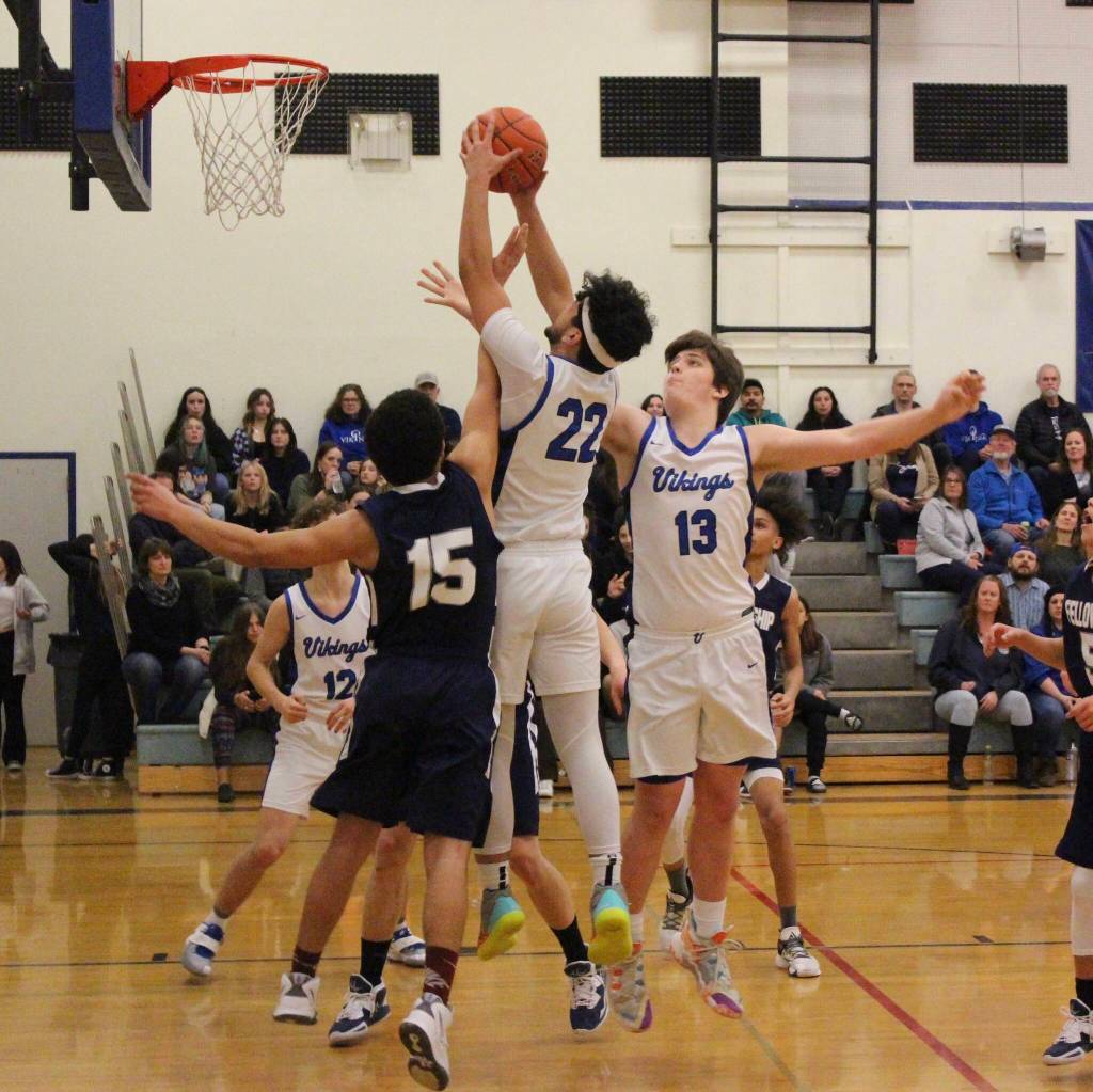 Corey Wiscomb photo.
Remy Lago goes head and shoulders over the competition to keep possession for his team.