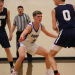 Corey Wiscomb photo. Tommy Anderson-Cleveland brings the defense.