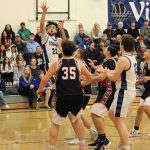 Corey Wiscomb photo.
Remy Lago squares up after contact for an and one score.