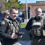 Kelley Balcomb-Bartok / Staff photo
San Juan County Sheriff Deputy Isaac Norton prepares to demonstrate the departments new drone as Deputy Ron Krebs looks on. Norton, along with two other deputies, have earned their FAA licenses to legally operate the new drones for the Sheriffs office.