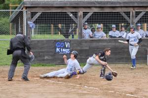 Alyson Stephens photo.
Eddie Cunningham slides into home.