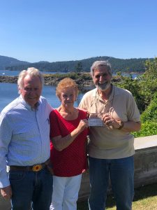 Contributed photo.
L-R: Gill Blinn, pilot in the program, Jan Cleveland, American Legion Auxiliary Chaplain and Jack Becker, Treasurer of the Orcas Aviation Association.