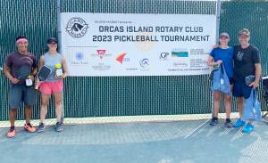 Group A Mixed Doubles finishers: Kevin and Christine Lee (second place), and Leah and Gib Black (first place).