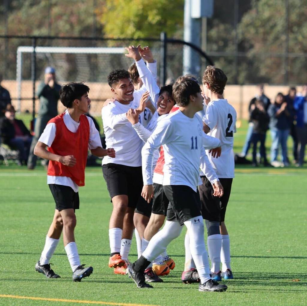 Alyson Stephens photo.
Some of the Vikings soccer team celebrating.