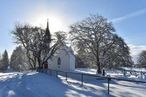 Kelley Balcomb-Bartok  Staff photo
Midday sun lights upon a snowy scene at the cemetery on San Juan island.