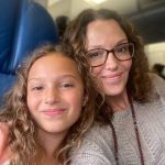 Eleanor and Monee on a flight to Oahu.