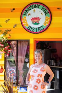 Satya Curcio photo.
Holly Dennis in front of her new restaurant.