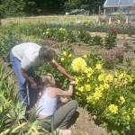 Colleen Smith Summers photo.
Carol helping customer Ady Graceman create a bouquet.
