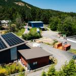 The Exchange (left) and baler building (right) have solar panels that will provide double the amount of electricity Orcas Recycling Services needs to operate.