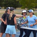 Player camaraderie: Jenny Shrum and Carolyn Storey with Patty Miller and Lisa Robson at the net.