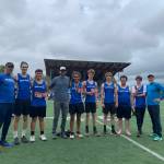 The track team. L-R, head coach Michael Kulper, Robin Limbach, Kenneth Farani, Assistant Coach Matt Tong, Tom Malo, Drew Nunez, Fin Ontjes, Max Peterson, Hugh Kirk and Assistant Coach Bill Kramer.