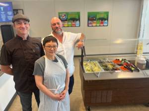 Colleen Smith Summers photo.
Left to right: Cafeteria staff Zach Holley and Bing Mowry and Food Service Director Madden Surbaugh.
