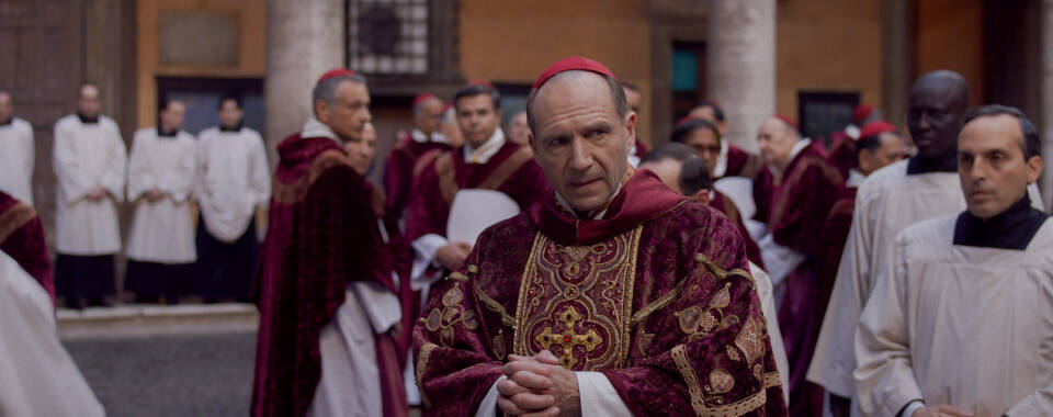 A scene from Conclave.
A scene from Conclave.
Conclave. Oscar nominees Ralph Fiennes, Stanley Tucci along with John Lithgow and Isabella Rossellini lead a brilliant cast in Academy Award-winning director Edward Bergers thrilling adaption of Robert Harris high-stakes drama, in which Cardinals gather at the Vatican to elect a new Pope.
Conclave. Oscar nominees Ralph Fiennes, Stanley Tucci along with John Lithgow and Isabella Rossellini lead a brilliant cast in Academy Award-winning director Edward Bergers thrilling adaption of Robert Harris high-stakes drama, in which Cardinals gather at the Vatican to elect a new Pope.