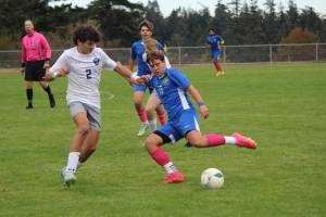 Cienna Richardson photo.
Andrzej Andre Kasperski during the game against MVC. Behind him is Viking Hayes Richardson and far right is Demetrio Salinas-Cruz.